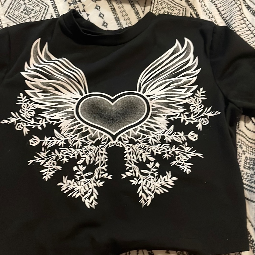 Black shirt with designs on front